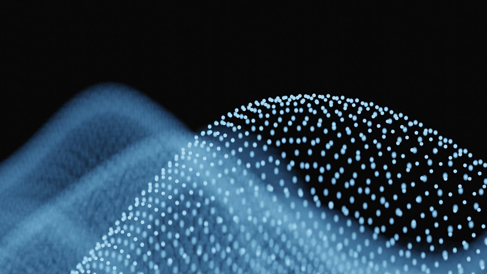 Waves of blue light particles on black